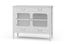 Load image into Gallery viewer, The Bramble Grosvenor Sideboard blends elegant display space with practical storage. Crafted from solid mahogany, it features two glass-front doors, a spacious illuminated interior, and a full-width shelf for displaying glassware, serving pieces, or treasured collections. Four drawers keep smaller essentials neatly organized. Bamboo-inspired moldings, tapered legs, and brass-finished hardware lend the piece a refined, tailored character. Good Bones Furniture
