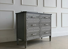 Load image into Gallery viewer, Inspired by antique Regency pieces, the Ambrose Chest by Ambella Homeblends classic architectural detailing with a refined, modern finish. Regency-style fretwork frames each of the six drawers, creating layered dimension and tailored symmetry across the façade. Good Bones Furniture
