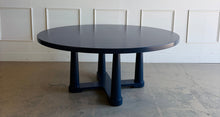 Load image into Gallery viewer, The Vienna Dining Table by Ambella Home makes a bold statement with its substantial 72" round top and sculptural pedestal base. This designer dining table has been professionally lacquered in Sherwin Williams Naval by Good Bones Furniture.
