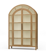Load image into Gallery viewer, The Vannes 2 Door Display Cabinet from Bramble combines architectural scale with warm natural materials, creating a statement piece designed for both storage and display. Crafted from solid mahogany, the cabinet features a dramatic arched silhouette with glass-paneled doors framed in a rich contrasting finish that highlights the craftsmanship and curvature of the design. Good Bones Furniture
