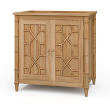 Load image into Gallery viewer, Elevate your bathroom with the Grosvenor Single Vanity, where classic design meets customizable luxury. Featuring beautiful faux bamboo fretwork on two cabinet doors, this piece brings timeless elegance with a touch of coastal and vintage charm. Good Bones Furniture
