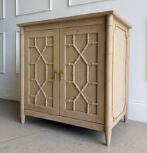 Load image into Gallery viewer, Elevate your bathroom with the Grosvenor Single Vanity, where classic design meets customizable luxury. Featuring beautiful faux bamboo fretwork on two cabinet doors, this piece brings timeless elegance with a touch of coastal and vintage charm. Good Bones Furniture
