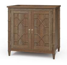 Load image into Gallery viewer, Elevate your bathroom with the Grosvenor Single Vanity, where classic design meets customizable luxury. Featuring beautiful faux bamboo fretwork on two cabinet doors, this piece brings timeless elegance with a touch of coastal and vintage charm. Good Bones Furniture
