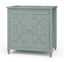 Load image into Gallery viewer, Elevate your bathroom with the Grosvenor Single Vanity, where classic design meets customizable luxury. Featuring beautiful faux bamboo fretwork on two cabinet doors, this piece brings timeless elegance with a touch of coastal and vintage charm. Good Bones Furniture
