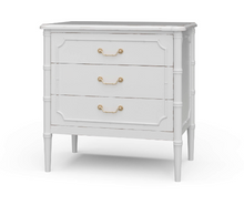 Load image into Gallery viewer, Classic faux bamboo with elevated detail. The Bramble Chelsea bedside table delivers a perfect balance of timeless coastal design and exceptional craftsmanship. Made from solid mahogany, this piece features elegant faux bamboo framing, tapered legs, and beautifully carved fretwork detailing on each drawer front. Solid brass hardware. Good Bones Furniture
