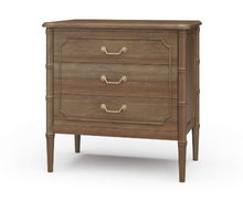 Load image into Gallery viewer, Classic faux bamboo with elevated detail. The Bramble Chelsea bedside table delivers a perfect balance of timeless coastal design and exceptional craftsmanship. Made from solid mahogany, this piece features elegant faux bamboo framing, tapered legs, and beautifully carved fretwork detailing on each drawer front. Solid brass hardware. Good Bones Furniture
