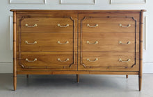 Load image into Gallery viewer, The Chelsea 6 Drawer Dresser is a stunning blend of classic craftsmanship and vintage-inspired charm. Designed in an exquisite faux bamboo style, this piece adds sophisticated texture and timeless appeal to any space. Crafted from solid mahogany, it offers both durability and beauty, making it a standout investment piece for your home. Solid brass hardware. Good Bones Furniture
