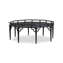 Load image into Gallery viewer, The Bramble Grosvenor Thrupence Coffee Table brings sculptural form and classic British-inspired detailing into a bold statement piece designed for sophisticated living spaces. Crafted from solid mahogany, the octagonal silhouette is framed by an architectural bamboo-inspired gallery rail that gives the table its distinctive presence and refined character. Good Bones Furniture
