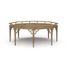 Load image into Gallery viewer, The Bramble Grosvenor Thrupence Coffee Table brings sculptural form and classic British-inspired detailing into a bold statement piece designed for sophisticated living spaces. Crafted from solid mahogany, the octagonal silhouette is framed by an architectural bamboo-inspired gallery rail that gives the table its distinctive presence and refined character. Good Bones Furniture

