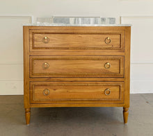Load image into Gallery viewer, Upgrade your space with this stunning Bramble Cholet single bathroom vanity, where classic design meets modern functionality. Crafted from solid mahogany in a variety of finishes, this piece brings warmth and timeless beauty to any bathroom.
Topped with luxurious marble, with a white American Standard undermount sink. Good Bones Furniture

