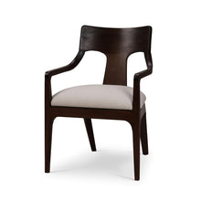 Load image into Gallery viewer, The Bramble Colorado Dining Armchair pairs sculptural lines with the lasting beauty of solid mahogany. Its gently curved backrest flows into slender arms, while an open-back design and tapered legs create a light, tailored silhouette. Generously cushioned seat upholstered in performance fabric. Good Bones Furniture
