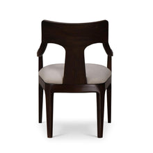 Load image into Gallery viewer, The Bramble Colorado Dining Armchair pairs sculptural lines with the lasting beauty of solid mahogany. Its gently curved backrest flows into slender arms, while an open-back design and tapered legs create a light, tailored silhouette. Generously cushioned seat upholstered in performance fabric. Good Bones Furniture
