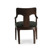 Load image into Gallery viewer, The Bramble Colorado Dining Armchair pairs sculptural lines with the lasting beauty of solid mahogany. Its gently curved backrest flows into slender arms, while an open-back design and tapered legs create a light, tailored silhouette. Generously cushioned seat upholstered in performance fabric. Good Bones Furniture
