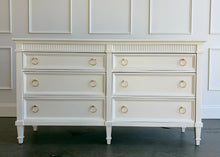 Load image into Gallery viewer, The Camelot Dresser blends refined simplicity with enduring craftsmanship. Built from solid mango wood and mango wood veneers, this six-drawer dresser is designed with clean, elegant lines and dovetailed drawer construction—ensuring it's as durable as it is beautiful. Each of the six spacious drawers glides smoothly on metal undermount self closing glides. Good Bones Furniture
