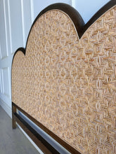Load image into Gallery viewer, Bring a little softness and natural texture to your bedroom with the Chloe Scalloped Rattan Headboard. Its graceful scalloped silhouette frames a natural rattan inset, creating a warm, inviting focal point above the bed. The Straw Wash finish gives the frame a gently lightwashed look, making it easy to pair with layered linens and collected accents. Good Bones Furniture
