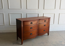 Load image into Gallery viewer, With its gently bowed front, clean lines, and understated traditional detailing, this vintage Dixie dresser offers a timeless silhouette that works beautifully in both classic and updated interiors. Six spacious drawers provide practical everyday storage, while the balanced proportions give the piece a tailored, versatile presence. Offered lacquered in your color of choice. Good Bones Furniture
