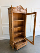 Load image into Gallery viewer, The Dunehaven Bamboo Bookcase turns treasured books and collected objects into a beautifully composed display. Its tall, narrow silhouette provides generous vertical storage without requiring a large footprint, making it especially useful in living rooms, libraries, dining rooms, or home offices. Crafted from mahogany solids with mango wood veneers, the cabinet’s Beachwood finish highlights the natural grain and warmth of the wood. Good Bones Furniture
