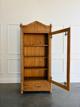Load image into Gallery viewer, The Dunehaven Bamboo Bookcase turns treasured books and collected objects into a beautifully composed display. Its tall, narrow silhouette provides generous vertical storage without requiring a large footprint, making it especially useful in living rooms, libraries, dining rooms, or home offices. Crafted from mahogany solids with mango wood veneers, the cabinet’s Beachwood finish highlights the natural grain and warmth of the wood. Good Bones Furniture
