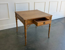Load image into Gallery viewer, The Dunehaven Bamboo Game Table creates an inviting spot for cards, Mahjong, or an intimate conversation, with a square top that brings everyone within easy reach. Bamboo-inspired trim, turned legs, and curved stretcher details give it the collected character of a timeless favorite. Good Bones Furniture
