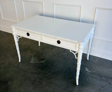 Load image into Gallery viewer, The new Dunehaven Bamboo Writing Desk brings the warmth and character of classic bamboo-inspired design to your home office, bedroom, or favorite writing corner. Its gently rounded trim, turned legs, and rich wood grain give the piece a collected, timeless feel, while two drawers keep papers and everyday essentials close at hand. Good Bones Furniture
