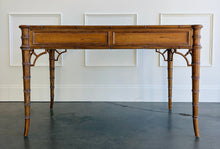 Load image into Gallery viewer, The new Dunehaven Bamboo Writing Desk brings the warmth and character of classic bamboo-inspired design to your home office, bedroom, or favorite writing corner. Its gently rounded trim, turned legs, and rich wood grain give the piece a collected, timeless feel, while two drawers keep papers and everyday essentials close at hand. Good Bones Furniture
