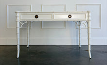 Load image into Gallery viewer, The new Dunehaven Bamboo Writing Desk brings the warmth and character of classic bamboo-inspired design to your home office, bedroom, or favorite writing corner. Its gently rounded trim, turned legs, and rich wood grain give the piece a collected, timeless feel, while two drawers keep papers and everyday essentials close at hand. Good Bones Furniture
