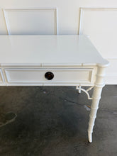 Load image into Gallery viewer, The new Dunehaven Bamboo Writing Desk brings the warmth and character of classic bamboo-inspired design to your home office, bedroom, or favorite writing corner. Its gently rounded trim, turned legs, and rich wood grain give the piece a collected, timeless feel, while two drawers keep papers and everyday essentials close at hand. Good Bones Furniture
