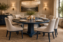 Load image into Gallery viewer, Inspired by Mid-Century design, the Maxwell Round Dining Table pairs clean architectural lines with softened curves for a look that feels modern yet timeless. Crafted from hand-selected oak solids and veneers, its generous 72-inch round top is supported by a substantial pedestal base with four gracefully curved feet. The table has been professionally lacquered by Good Bones Furniture in Farrow &amp; Ball Hague Blue.
