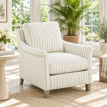 Load image into Gallery viewer, The Olivia Lounge Chair by Fairfield Chair pairs timeless tailoring with exceptional comfort. Upholstered in the Classic stripe fabric, its balanced pattern complements the traditional silhouette and distinctive rolled pleated arms. The upholstery combines 44% rayon, 40% post-consumer recycled polyester, and 16% polyester for a soft, durable finish. Good Bones Furniture
