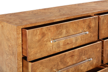 Load image into Gallery viewer, The Fremont Dresser is a bold, architectural storage piece that showcases the natural drama of burled ash. Its clean, rectilinear form allows the intricate grain pattern to take center stage, creating a rich, organic texture across the entire façade. Good Bones Furniture
