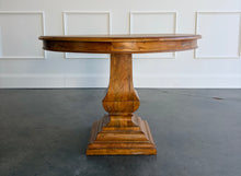 Load image into Gallery viewer, Bring the essence of the Italian countryside into your home with the Pastry Table with Tuscan Style Base. This beautifully designed piece features a solid mango wood construction that’s built to last, paired with a classic Tuscan-inspired pedestal base. The Beachwood finish brings out the natural beauty of the wood, with light, warm tones that add a touch of elegance to any setting. Good Bones Furniture
