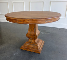 Load image into Gallery viewer, Bring the essence of the Italian countryside into your home with the Pastry Table with Tuscan Style Base. This beautifully designed piece features a solid mango wood construction that’s built to last, paired with a classic Tuscan-inspired pedestal base. The Beachwood finish brings out the natural beauty of the wood, with light, warm tones that add a touch of elegance to any setting. Good Bones Furniture
