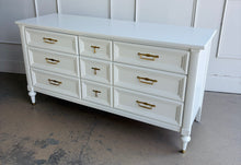 Load image into Gallery viewer, This vintage seven drawer dresser by White Furniture Co. showcases the exceptional craftsmanship and timeless proportions that made the North Carolina manufacturer one of America's most respected furniture makers. Professionally lacquered in White Dove by Benjamin Moore, this piece can complement everything from traditional interiors to today's transitional and modern homes. Good Bones Furniture
