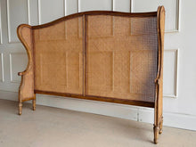 Load image into Gallery viewer, The Kingstone Cane Headboard brings the perfect blend of natural beauty and refined elegance to your bedroom. Constructed with a solid mango wood frame and detailed with stunning cane along the back and sides, this headboard exudes craftsmanship and style. Its clean lines and rich textures make it an ideal choice for both modern and traditional interiors. Good Bones Furniture
