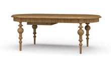 Load image into Gallery viewer, Butterfly oval extension dining table in Antique French Oak mahogany shown closed, featuring sculpted apron and turned legs, Kraton dining table by Good Bones Furniture in Raleigh, NC
