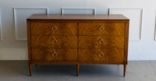 Load image into Gallery viewer, The Lipton Six Drawer Dresser blends neoclassical restraint with the warmth and refinement of early-20th-century European cabinetry. Its silhouette is grounded and architectural, yet softened by subtle curves, tapered legs, and a finely scaled apron—details that keep the piece feeling elegant rather than formal. Good Bones Furniture

