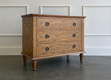 Load image into Gallery viewer, The Milano Large Nightstand is a harmonious blend of thoughtful craftsmanship and versatile style. Handcrafted from solid mahogany and burled ash veneer, it offers three roomy drawers fitted with smooth, self closing glides for effortless access to your evening essentials. Solid brass hardware punctuates the design. Good Bones Furniture
