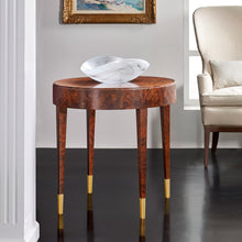 Load image into Gallery viewer, The Modern History Salena Round End Table brings together sculptural simplicity and the rich visual drama of burl wood. Its clean circular silhouette highlights the striking natural patterns of burl veneer, creating a piece that feels both refined and organic. Walnut Burl veneer. Good Bones Furniture
