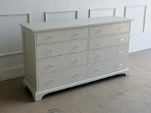 Load image into Gallery viewer, A timeless Newport Cabinet Company dresser professionally refinished in Benjamin Moore Natural Cream, creating a fresh, sophisticated look while preserving its exceptional craftsmanship. Featuring eight generously sized drawers, this dresser offers abundant storage with clean, tailored lines that complement both traditional and transitional interiors. Good Bones Furniture
