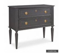 Load image into Gallery viewer, The Phillips Scott Franklin Chest pairs classic proportions with practical storage and a light, elevated silhouette. Crafted from hardwood solids and veneers, it features two spacious drawers framed by traditional molding. Brass hardware and decorative key escutcheons add warmth, while the molded top and tall tapered legs complete its timeless design. Good Bones Furniture
