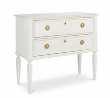 Load image into Gallery viewer, The Phillips Scott Franklin Chest pairs classic proportions with practical storage and a light, elevated silhouette. Crafted from hardwood solids and veneers, it features two spacious drawers framed by traditional molding. Brass hardware and decorative key escutcheons add warmth, while the molded top and tall tapered legs complete its timeless design. Good Bones Furniture
