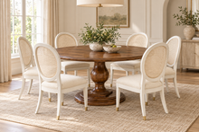 Load image into Gallery viewer, The 60 inch Phillips Scott Lafayette Dining Table offers generous seating for six with added elbow room and ample space for serving pieces. Crafted from hardwood solids and veneers, the tabletop features a layered molded edge supported by a sculptural turned pedestal and substantial tiered base. Good Bones Furniture
