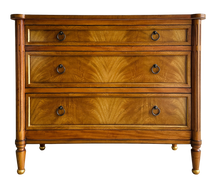 Load image into Gallery viewer, Elegant and effortlessly functional, the Riley Mahogany Chest pairs classic proportions with luxe details. A cerejeira (Brazilian oak) veneer creates a striking feathered grain across the drawer fronts, framed by subtle gold trim that’s echoed on the turned feet. Finished in a warm mahogany tone with mahogany or marble top and fitted with antique brass ring pulls, Riley brings tailored sophistication to bedrooms, entryways, or living spaces while offering generous, everyday storage. Good Bones Furniture
