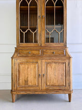 Load image into Gallery viewer, Elevate your dining or living space with the timeless elegance of the Rosalind China Cabinet. Handcrafted from solid mango wood and mango wood veneers, this cabinet combines durability with natural beauty, showcasing the wood's rich, warm tones and unique grain patterns. Its sleek design is complemented by solid brass hardware, adding a touch of refined sophistication. Good Bones Furniture
