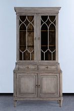 Load image into Gallery viewer, Elevate your dining or living space with the timeless elegance of the Rosalind China Cabinet. Handcrafted from solid mango wood and mango wood veneers, this cabinet combines durability with natural beauty, showcasing the wood's rich, warm tones and unique grain patterns. Its sleek design is complemented by solid brass hardware, adding a touch of refined sophistication. Good Bones Furniture
