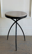 Load image into Gallery viewer, This pair of Studio|A accent tables blends sculptural ironwork with natural stone in a way that feels both organic and architectural. Featuring hand-worked forged iron bases with airy tripod silhouettes, the tables have a visually light presence despite the substantial stone tops. Good Bones Furniture
