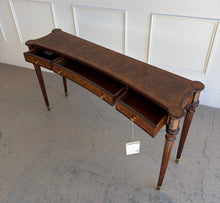 Load image into Gallery viewer, Theodore Alexander Grandinson console with three frieze drawers open, revealing functional storage beneath a flame walnut and yew burl veneered top
