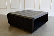 Load image into Gallery viewer, The Spencer St. James Square Cocktail Table by Theodore Alexander combines bold contemporary form with richly tactile materials. Crafted from oak wood and crocodile-embossed leather, its substantial square silhouette features clipped corners that soften the strong architectural lines. Good Bones Furniture
