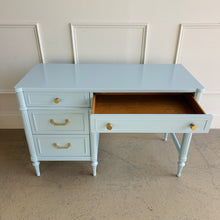 Load image into Gallery viewer, Side perspective of a Thomasville vintage writing desk in Sherwin-Williams Billowy Breeze, showing refined drawer fronts, fluted legs, and clean brass hardware in a compact, functional design
