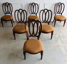 Load image into Gallery viewer, Thomasville Ernest Hemingway Collection 9-piece dining set. Designed with classic European influences and the relaxed sophistication that defines the Ernest Hemingway Collection, this complete dining suite features a beautifully figured mahogany extension table paired with six sculptural loop-back side chairs and two generously proportioned host armchairs. Good Bones Furniture
